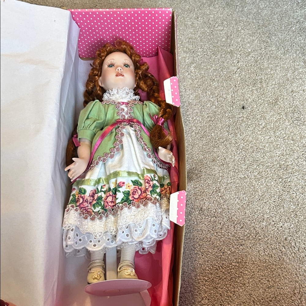 Charming Porcelain Doll with Green and White Dress
